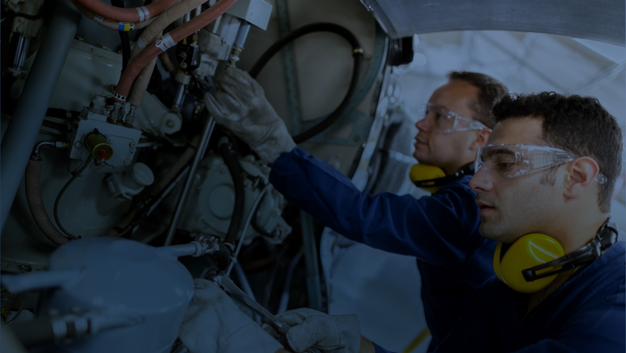 Article header image of aviation mechanics working on an airplane